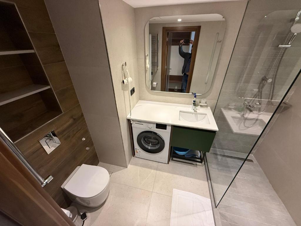 تصویر اتاق‌های Premium Apartment in 6 May Park - تصویر ۲