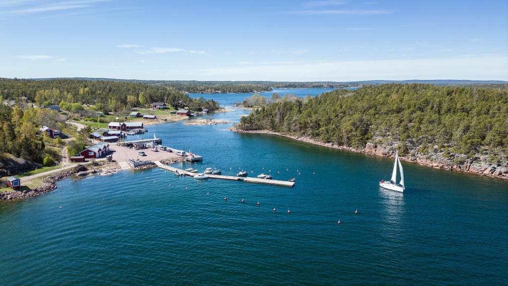 an aerial view of a boat in a river at Spend a night on a Sailing Boat in Saltvik