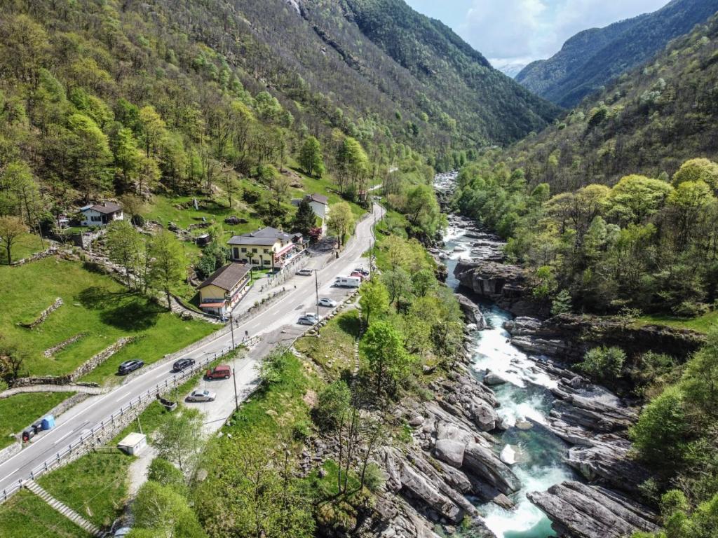 a view of a river and a road in a valley at Appartamenti Posse- Verzasca in Lavertezzo