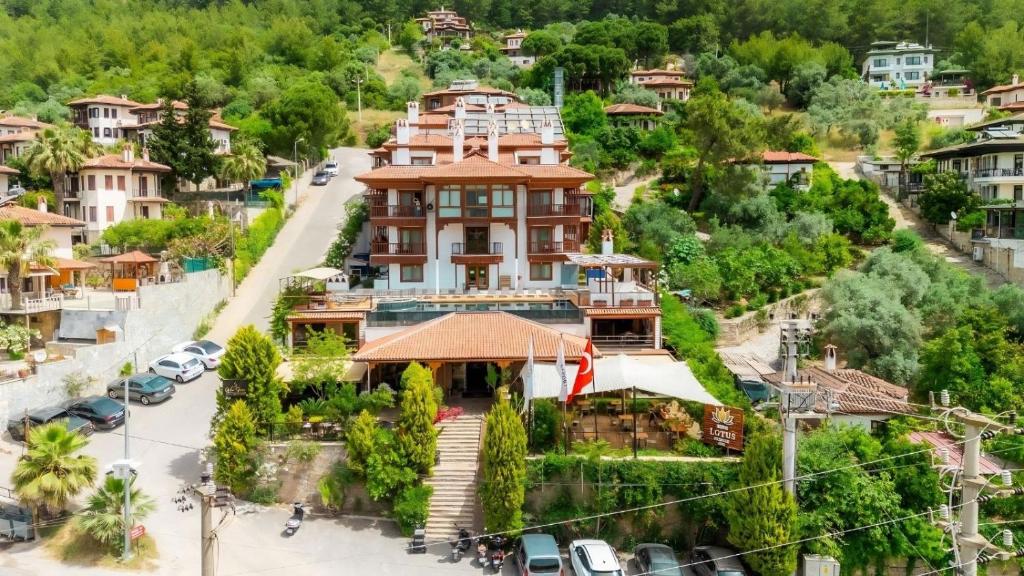 an aerial view of a building in a city at Hotel Lotus Spa&Sport Akyaka in Akyaka