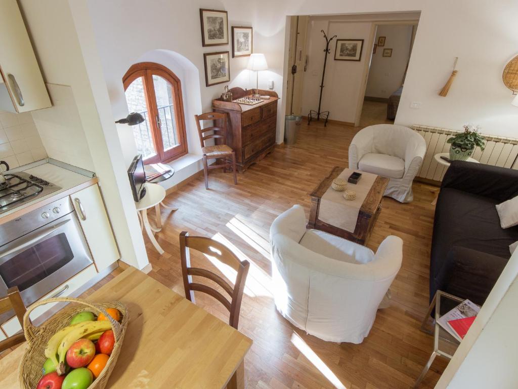 a kitchen and living room with a table and chairs at non attivo Tower Salterelli in Florence