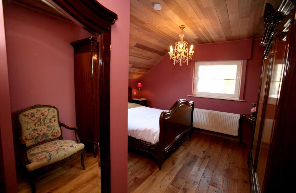 Postel nebo postele na pokoji v ubytování B&B Les Secrets de la Vie