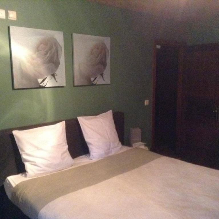 Postel nebo postele na pokoji v ubytování B&B Les Secrets de la Vie