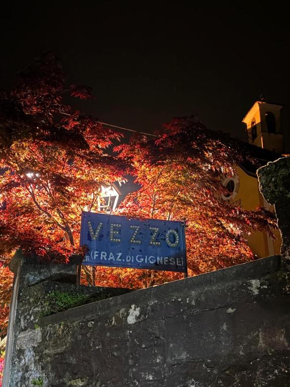a sign that is on the side of a building at L'Angulin in Vezzo