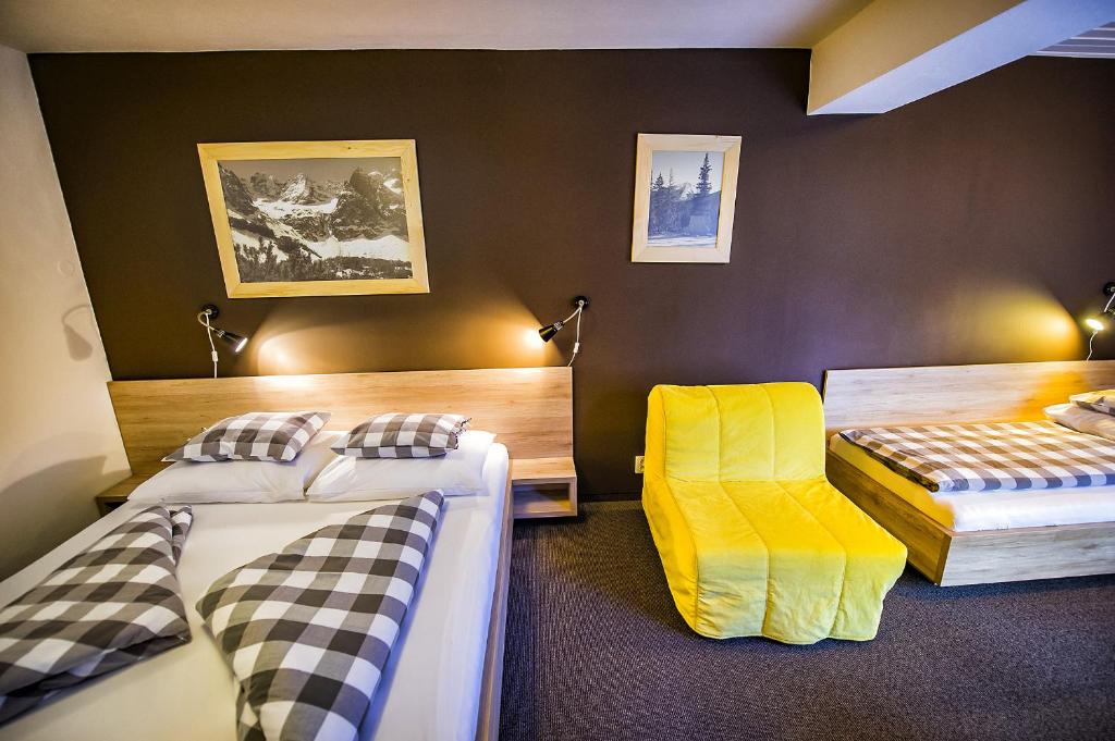 Letto o letti in una camera di Penzion Flores