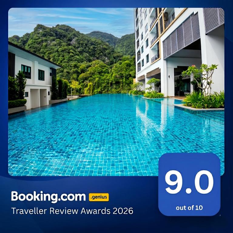 an image of a swimming pool in a building at Sunway Onsen Suite in Tambun