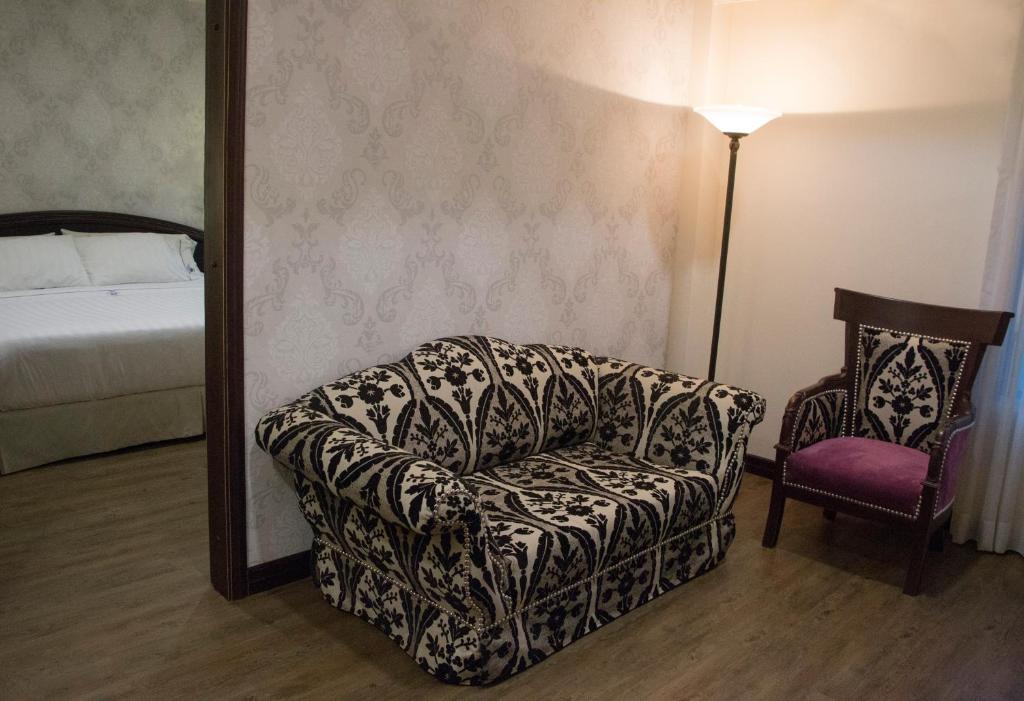 Postel nebo postele na pokoji v ubytování Hotel Castilla Real