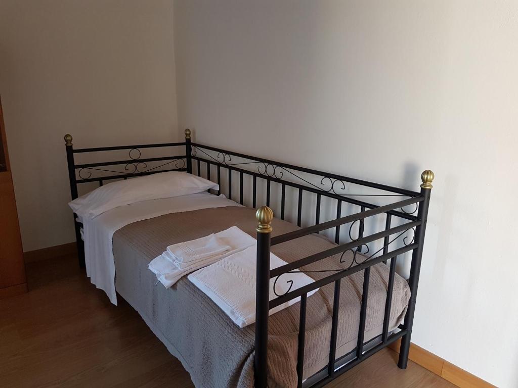 Llit o llits en una habitació de Corte Pomponazza