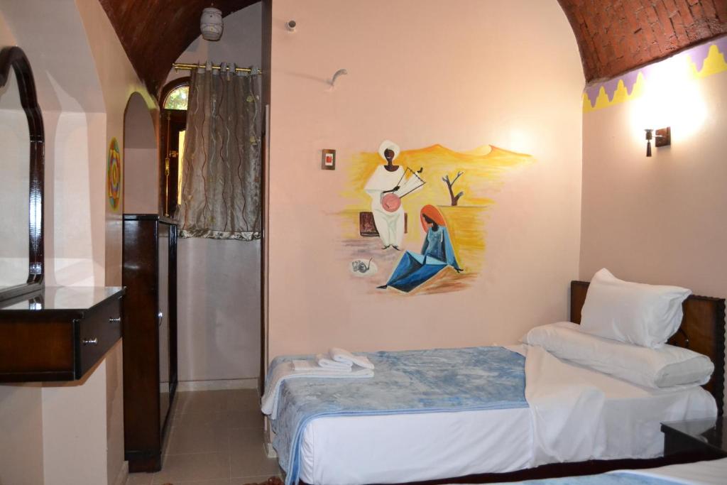 Tuya Hotel房間的床