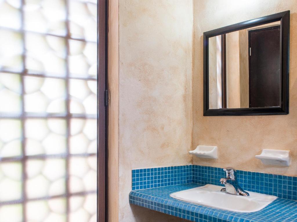Koupelna v ubytování Hotel Barrio Latino