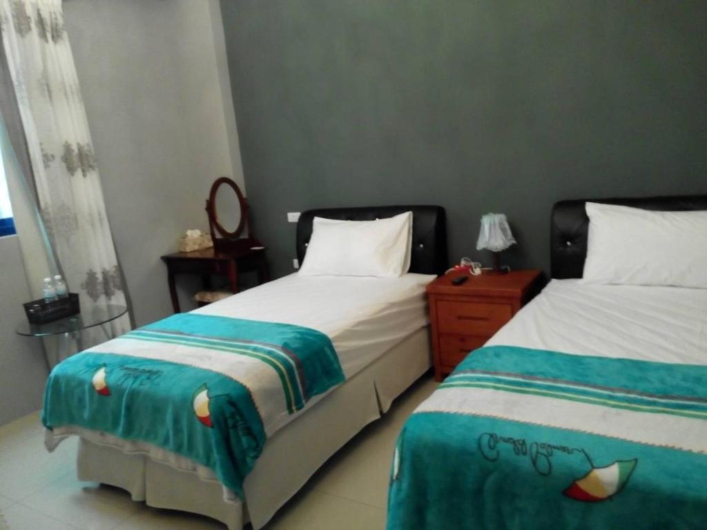 Postel nebo postele na pokoji v ubytování Marathon B&B