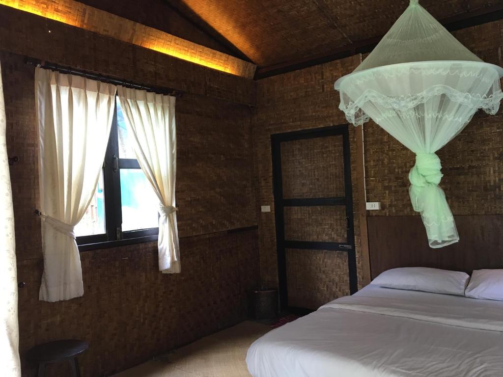 Postel nebo postele na pokoji v ubytování Paipunthong Resort