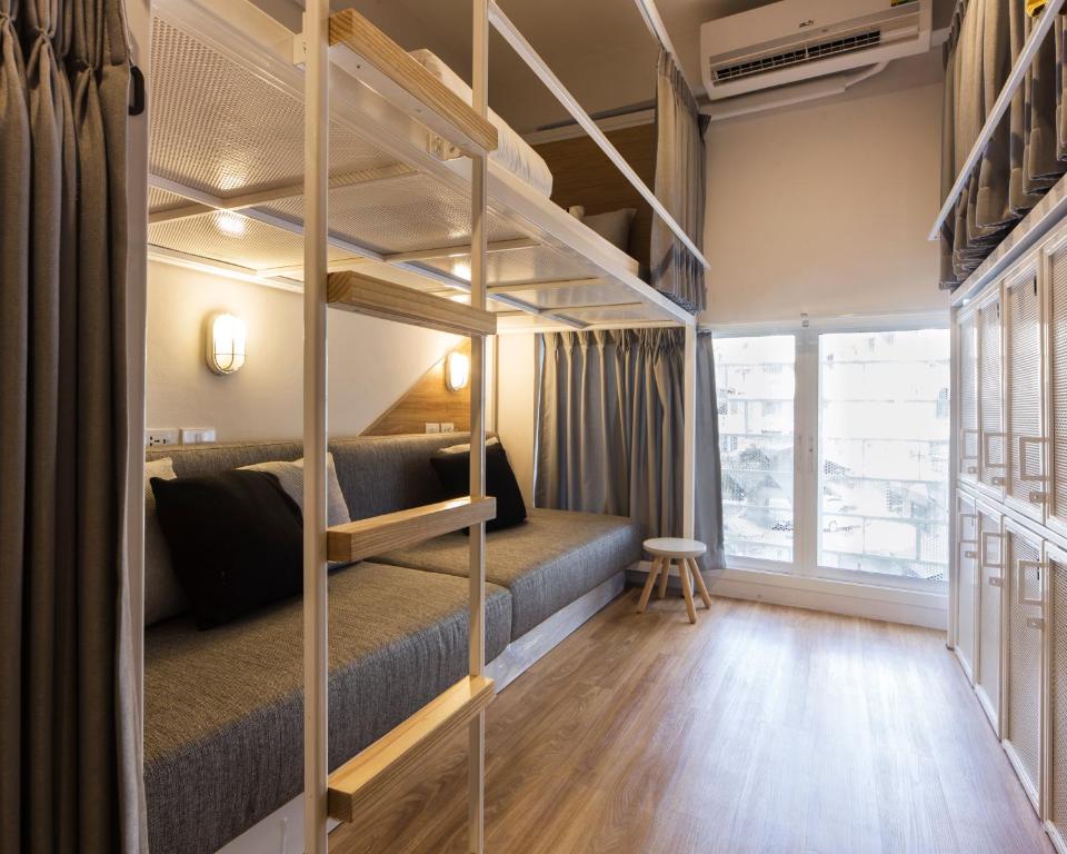 Postel nebo postele na pokoji v ubytování Bed One Block Hostel