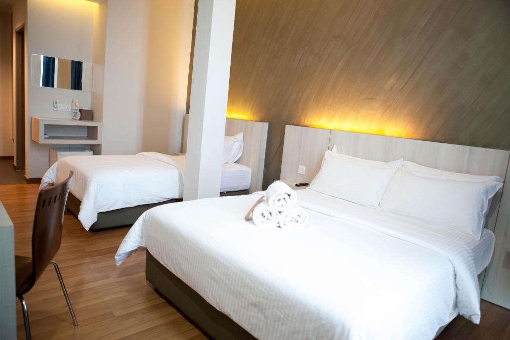 Postel nebo postele na pokoji v ubytování Inn86