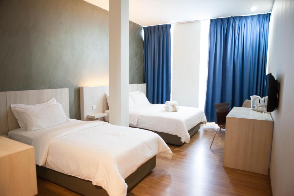 Postel nebo postele na pokoji v ubytování Inn86