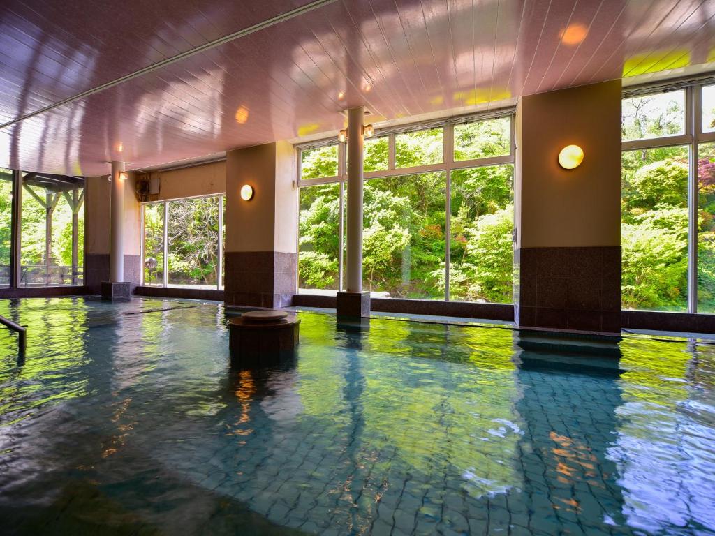Bazén v ubytování Yuze Hotel nebo v jeho okolí
