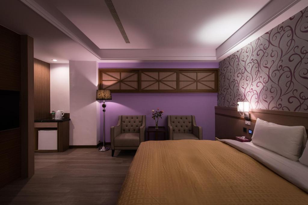 Postel nebo postele na pokoji v ubytování Sir Motel - Sanchong