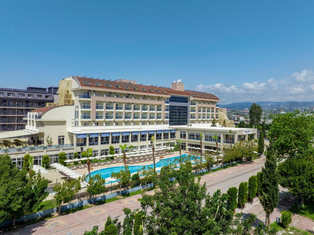 an aerial view of a hotel with a pool at Solivia hotel in Alanya