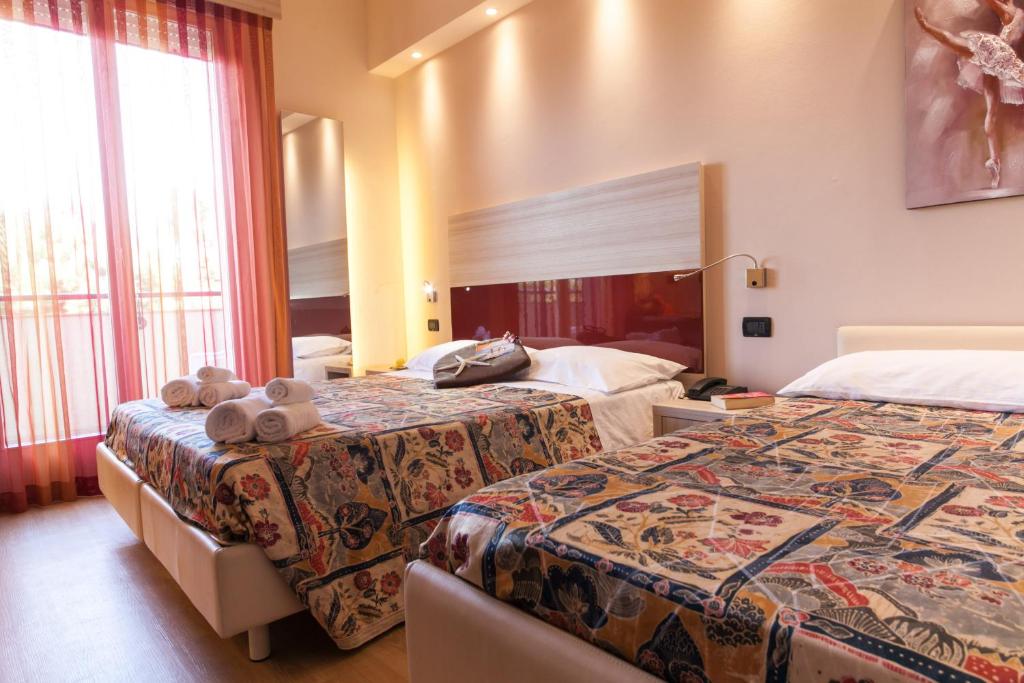 Postel nebo postele na pokoji v ubytování Hotel Krone