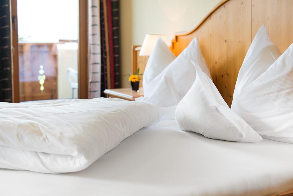 Postel nebo postele na pokoji v ubytování Hotel Jägerhof