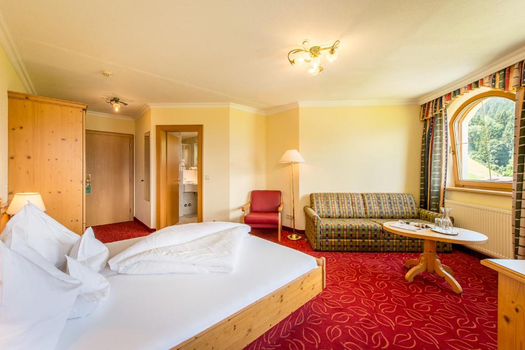 Postel nebo postele na pokoji v ubytování Hotel Jägerhof
