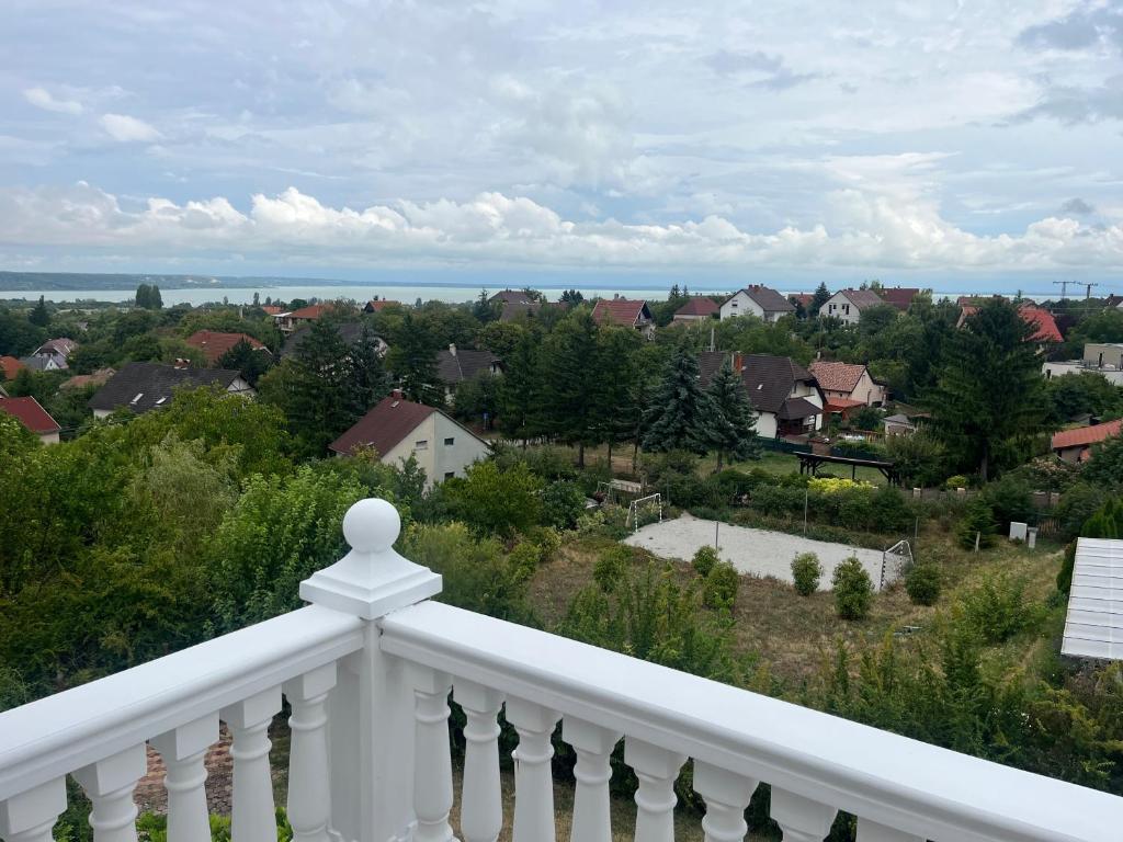 a view from the balcony of a house at Balatonalmádi Pipacs Villa in Balatonalmádi