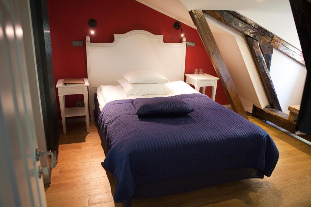 Postel nebo postele na pokoji v ubytování Hotel Hellstens Malmgård