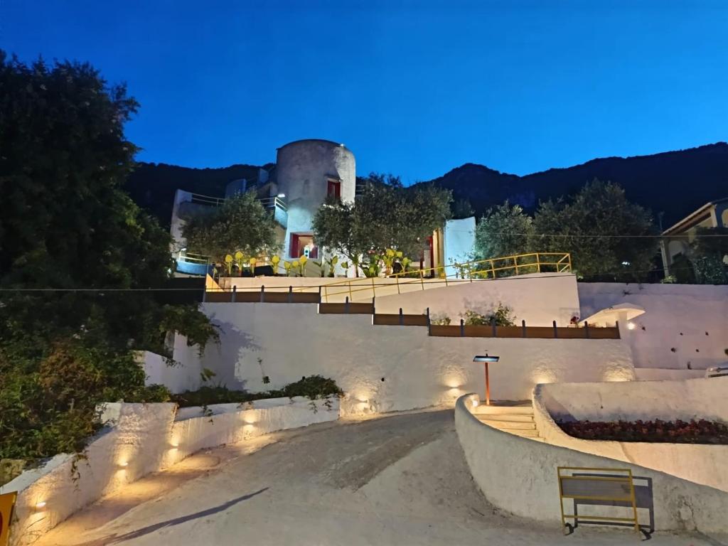 a night view of a skate park with a castle in the background at La casa di Aurora - Room A - Boutique Hotel in Agios Ioannis Peristerion