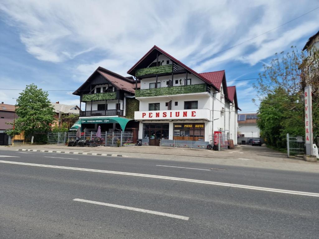 a building on the side of a street at Riviera Valceana in Râmnicu Vâlcea