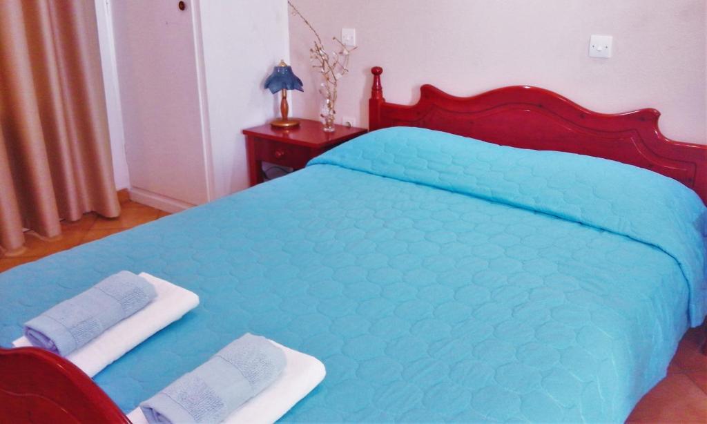 Postel nebo postele na pokoji v ubytování Ostria Eressos Rooms