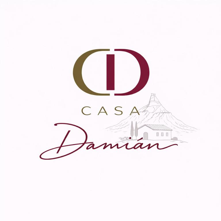 a logo for a restaurant with a letter d and a building at Casa Damián in Ribaforada