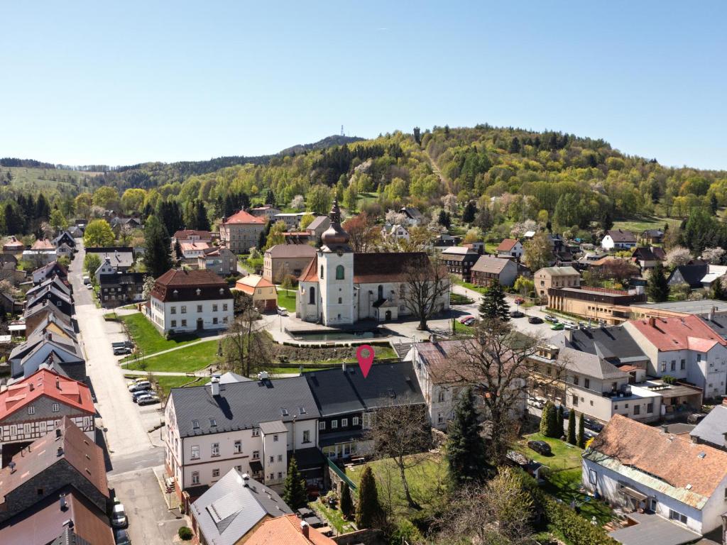 an aerial view of a small town with houses at Chalupa Domovina in Jiřetín pod Jedlovou