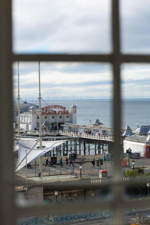 a view of a pier from a window at Pier Court Apartments Brighton in Brighton & Hove