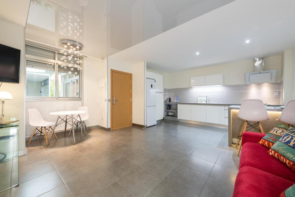 Kuchyň nebo kuchyňský kout v ubytování Suites Garden Loft Velázquez