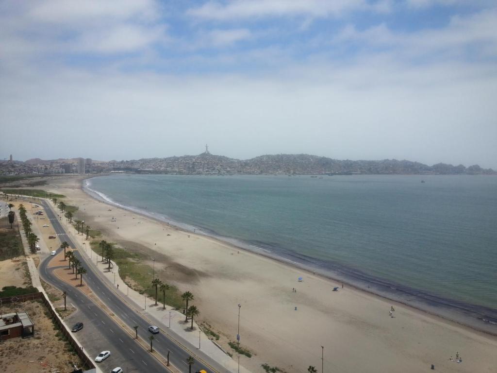 an aerial view of a beach with the ocean at Departamento Costa Mansa in Coquimbo