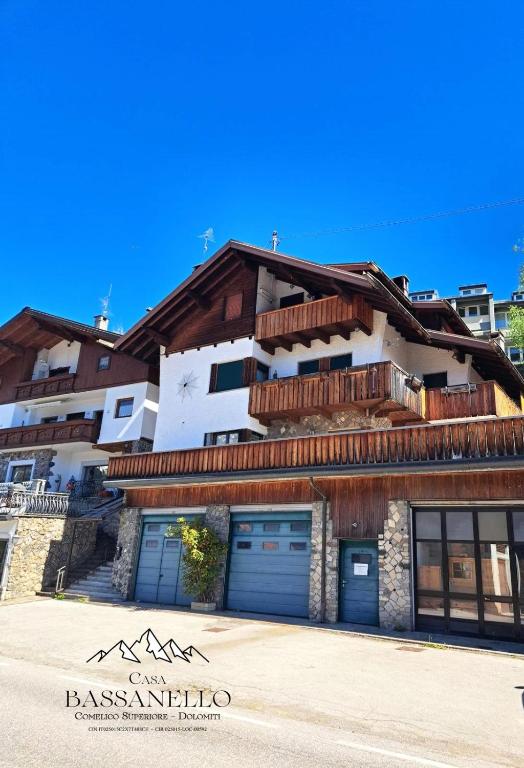 a building with two garage doors in front of it at Casa Bassanello in Candide