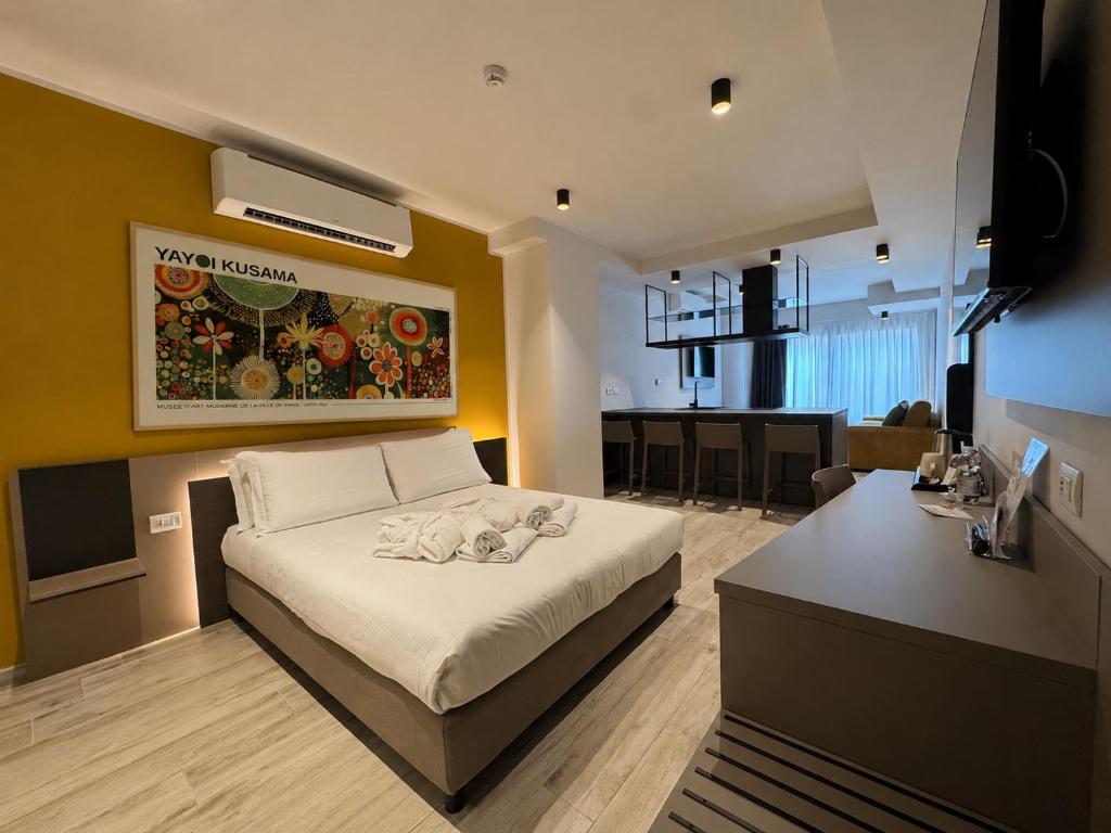 a bedroom with a large bed in a room at Best Quality Hotel Politecnico in Turin