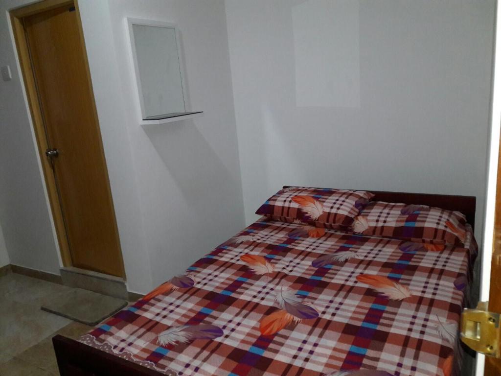 Postel nebo postele na pokoji v ubytování Oudarya Guest