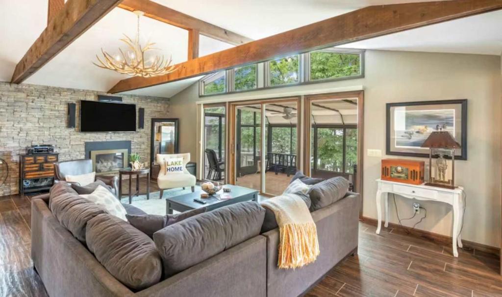 a large living room with a large couch at Unforgettable Lake Memories in Lake Ozark