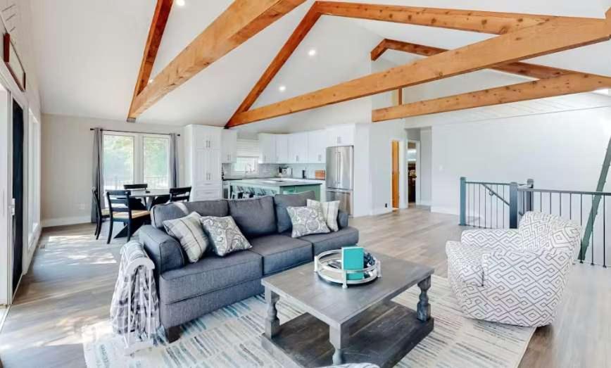 a living room with a couch and a table at Lake Ozarks in Rocky Mount
