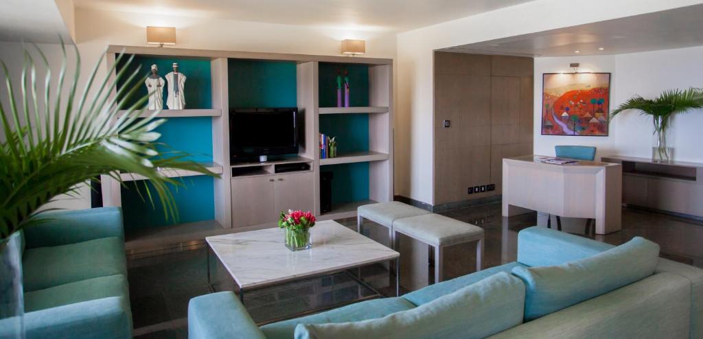 TV a/nebo společenská místnost v ubytování Eko Hotel Main Building