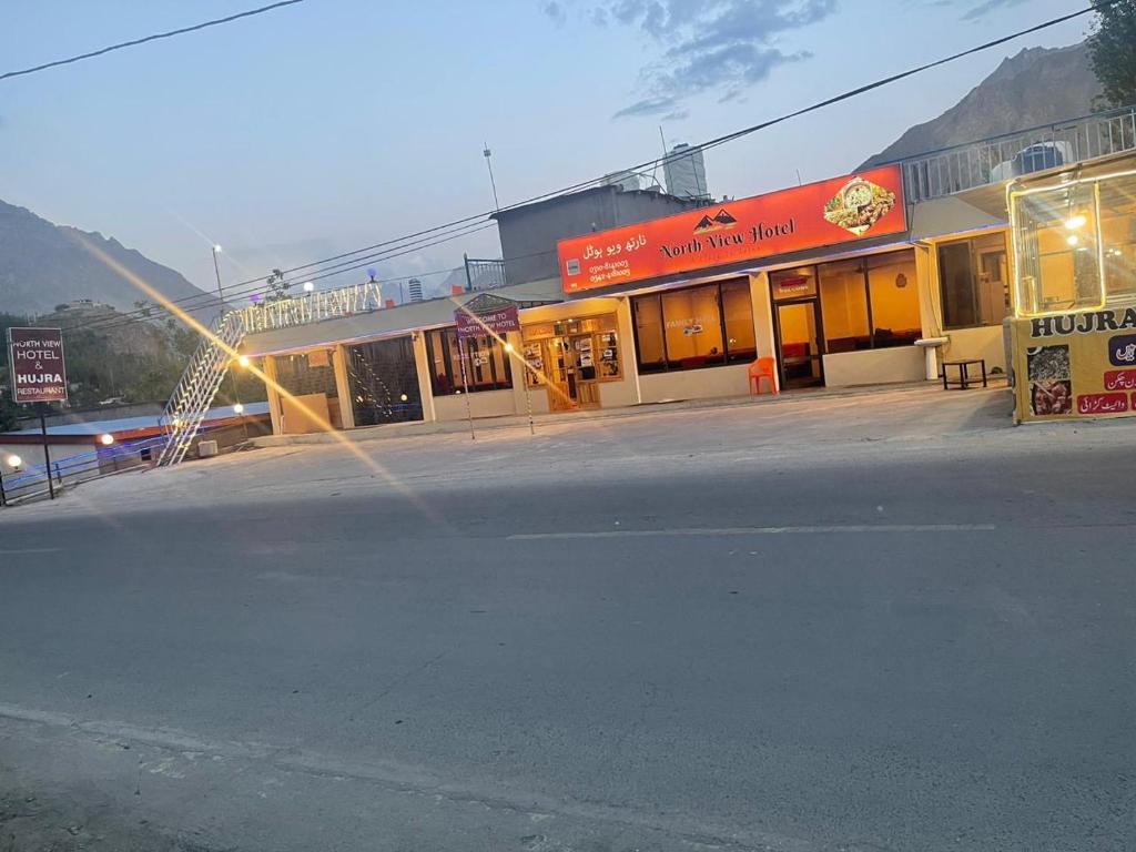 an empty street in front of a building at Northview Hotel Hunza in Hunza Valley