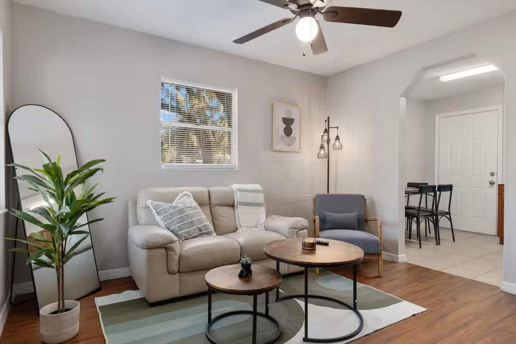 a living room with a couch and a table at Silver Springs Retreat in Silver Springs