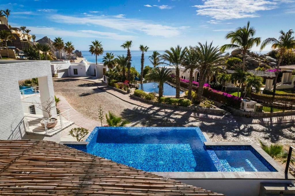 an aerial view of a resort with a swimming pool at Casa Santos Pedregal in Cabo San Lucas