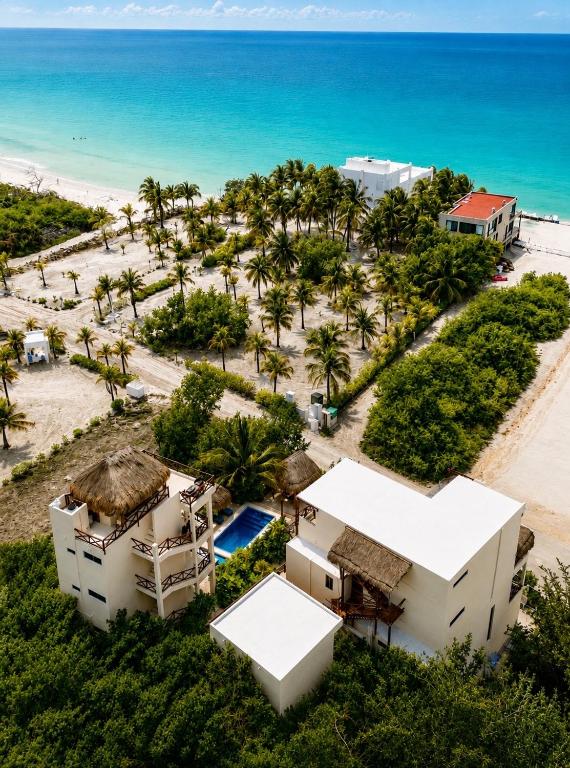 an aerial view of a resort and the beach at Island Escape for Groups Hosted by Atenea Holbox in Holbox Island
