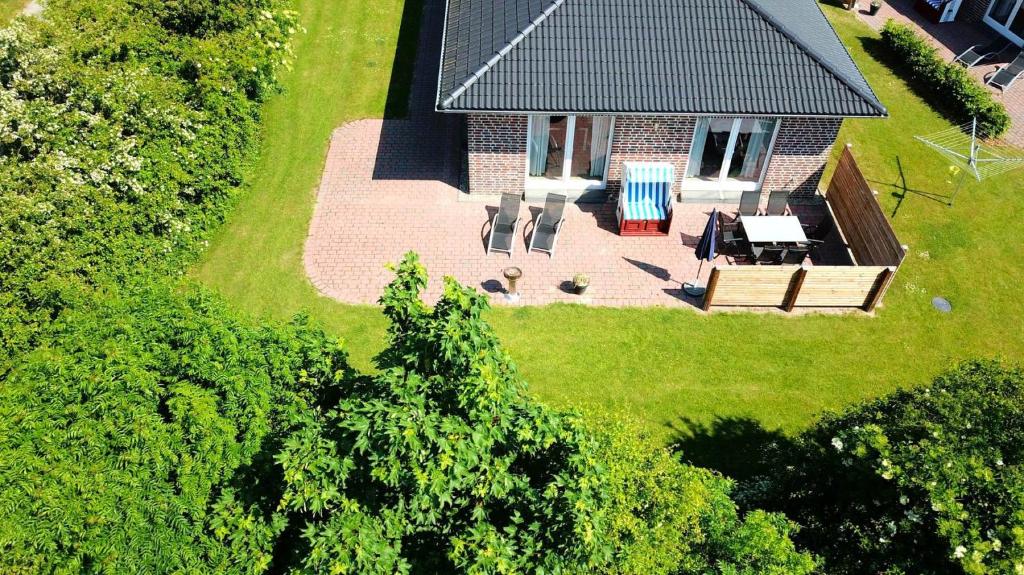an aerial view of a house with a roof at Bauernhof Claussen Fehmarn in Fehmarn