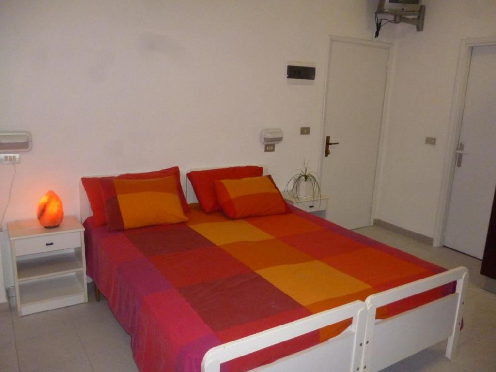 Postel nebo postele na pokoji v ubytování Residence BluAdria