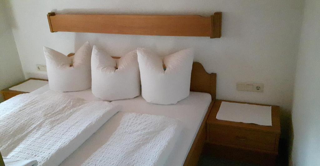 Postel nebo postele na pokoji v ubytování Apartmenthaus Immler