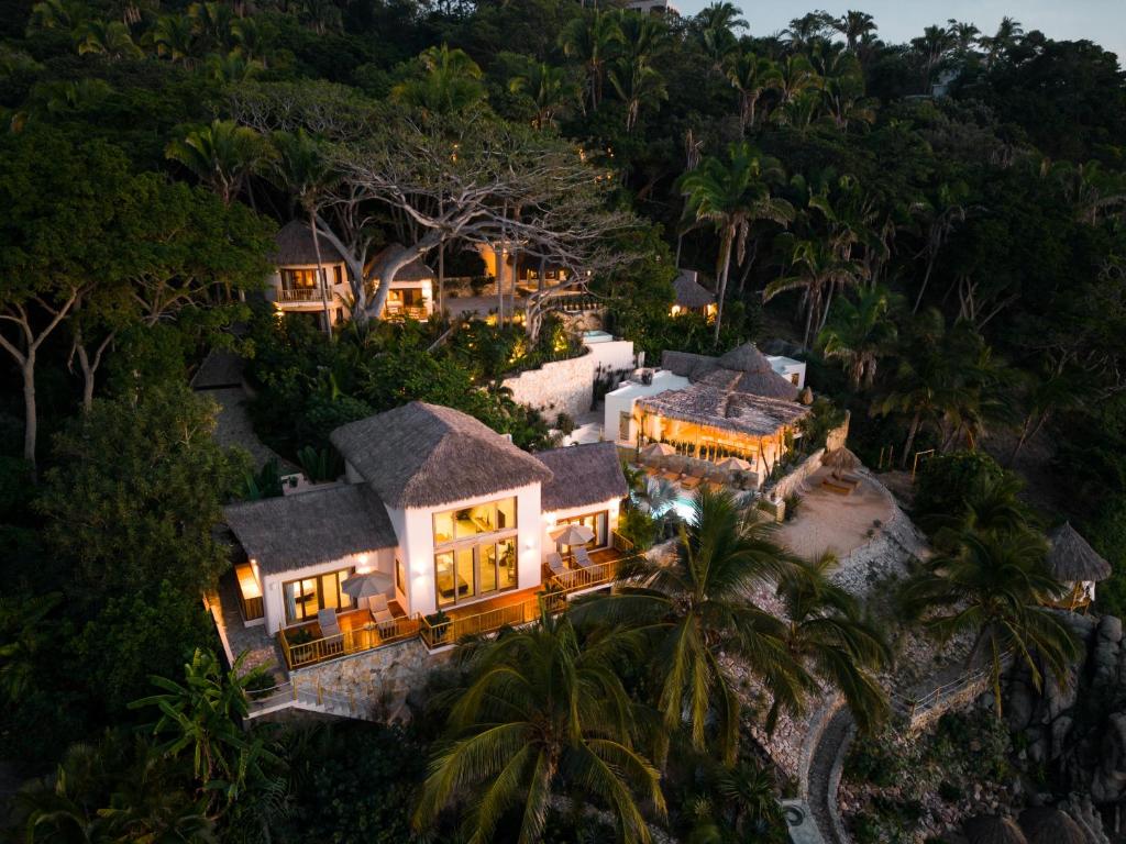 an aerial view of a house on a hill at La Joya Sayulita in Sayulita