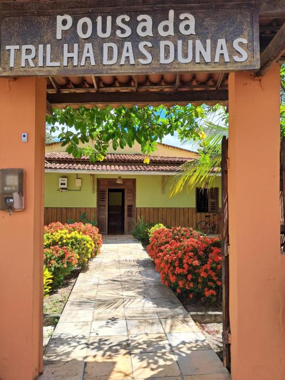 a sign for a pueblo filha dos dumas at Pousada Trilha das Dunas in Jericoacoara
